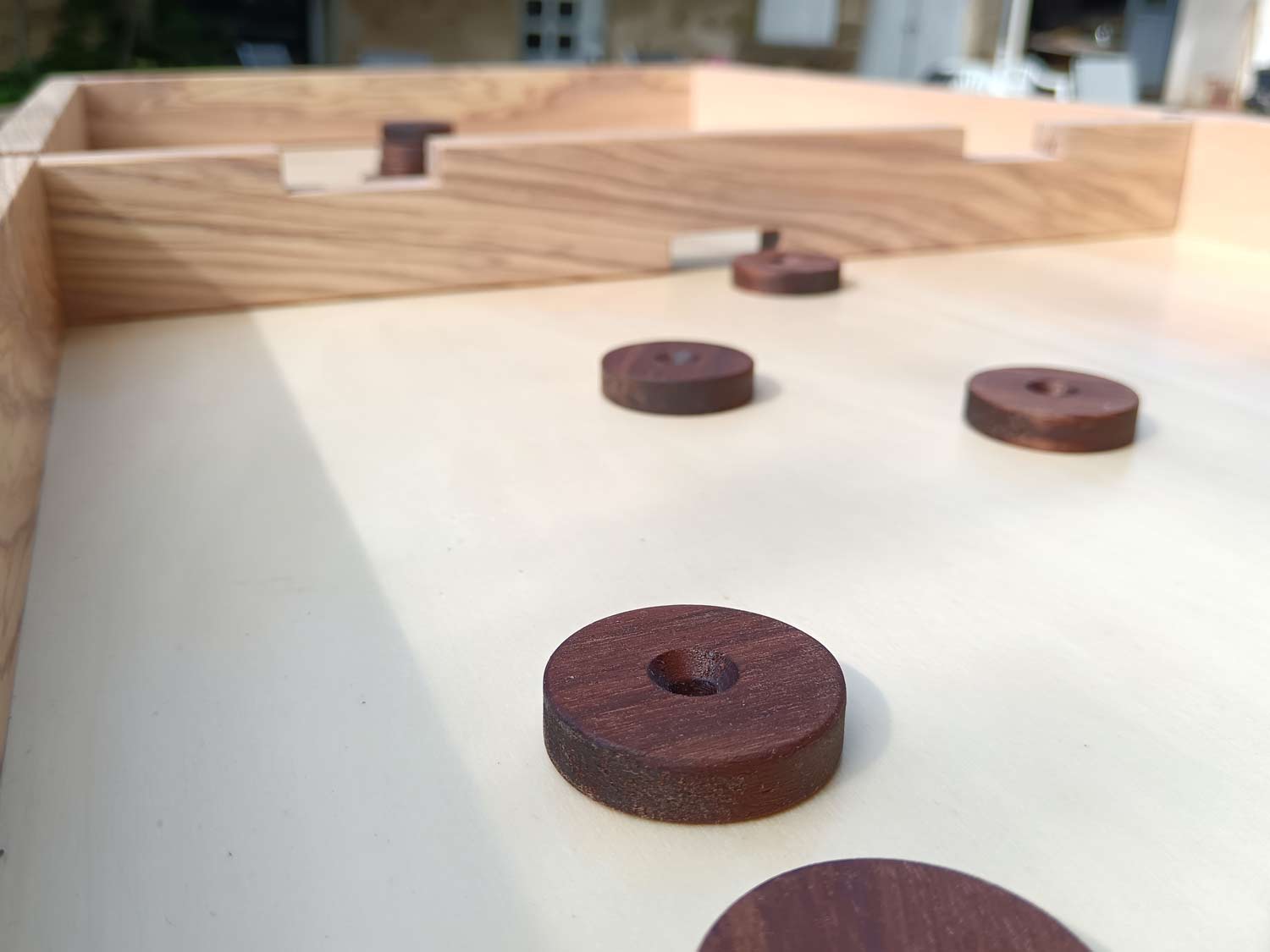 jeu de passe trap, créé par l'atelier du boa, ébéniste à Châteauneuf-sur-Isère au cœur de la Drôme (26)